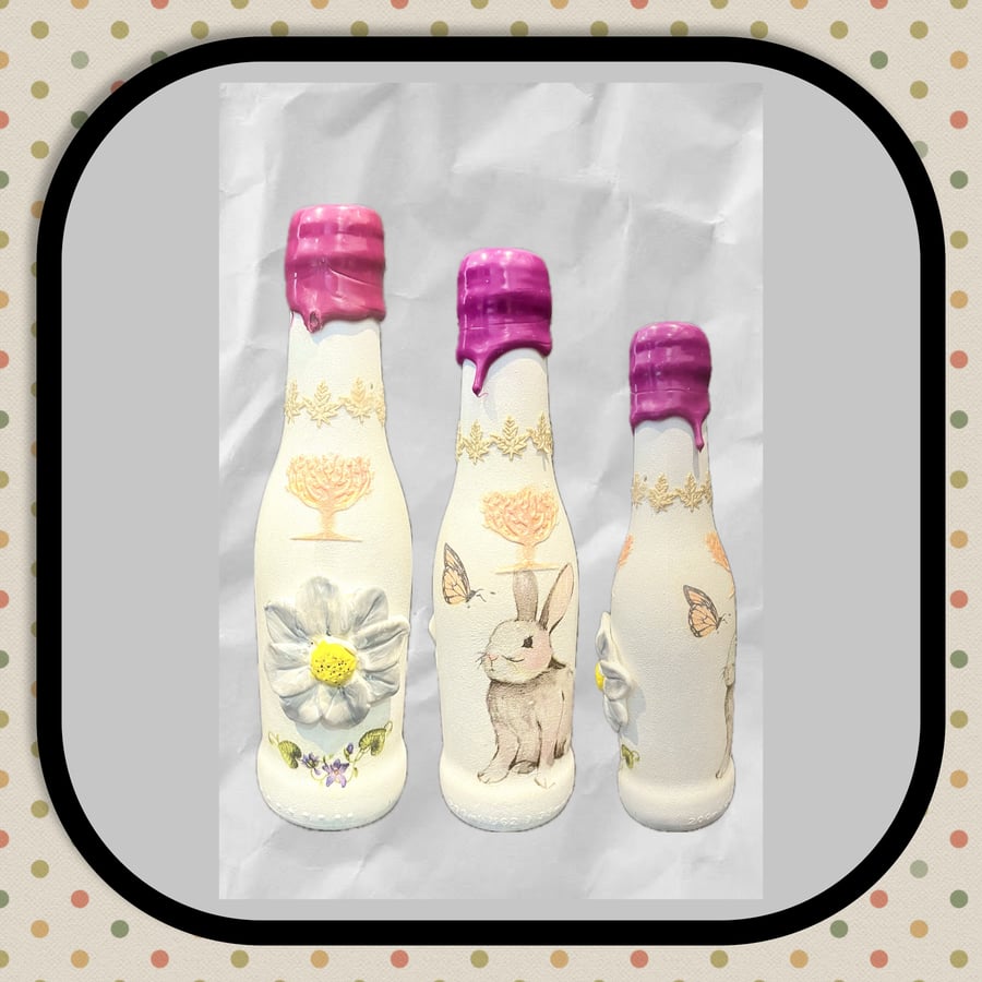 Up cycled bottle with rabbit design and 3D flower