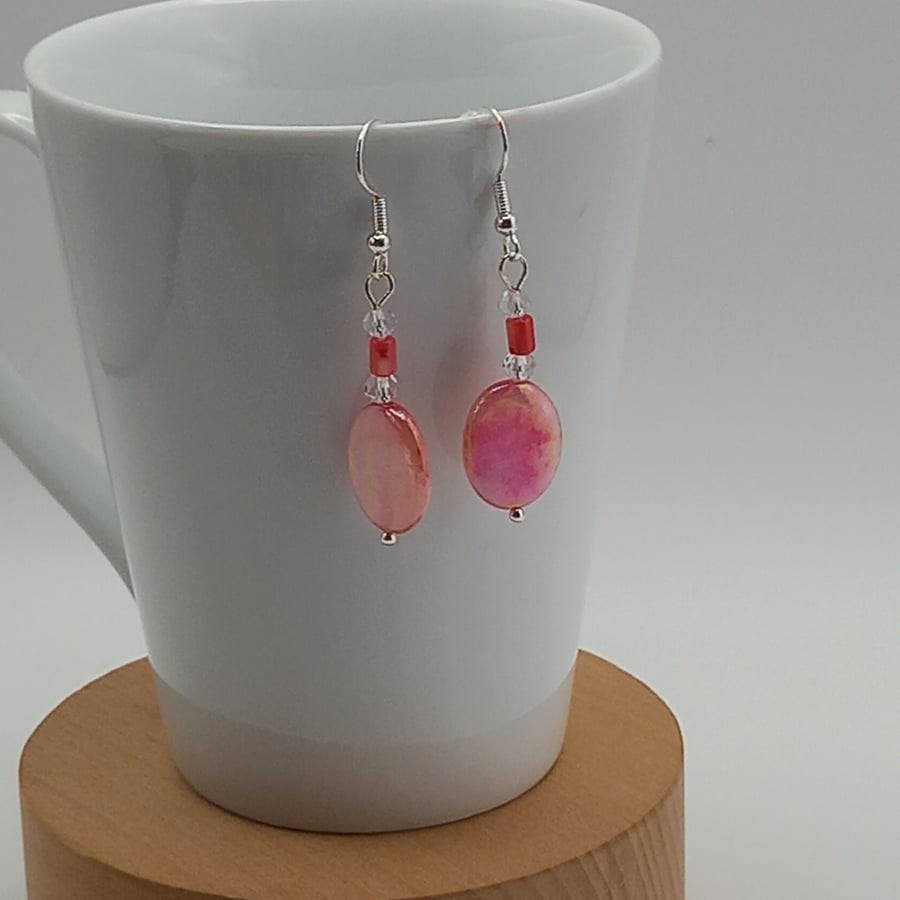 Oval shell earrings with coral shell beads