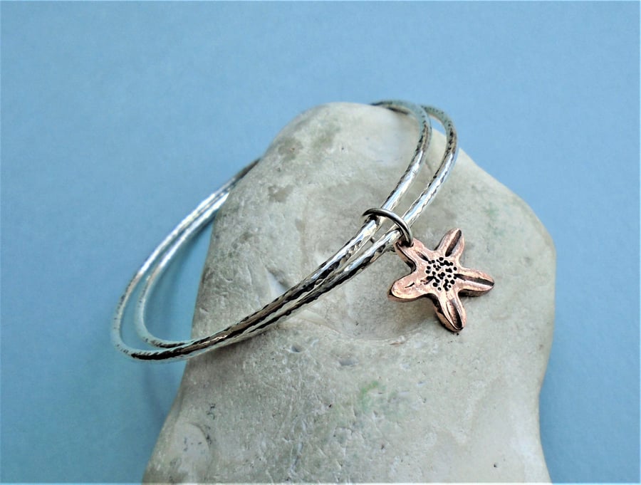 Double bangle with copper flower charm