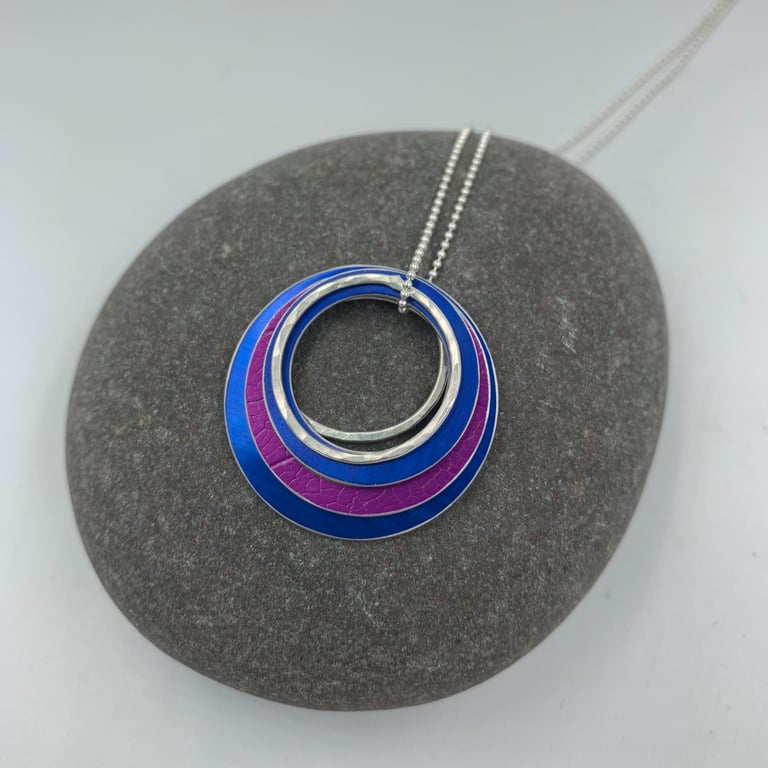 Ripples circle pendant in navy and pink with recycled silver ring