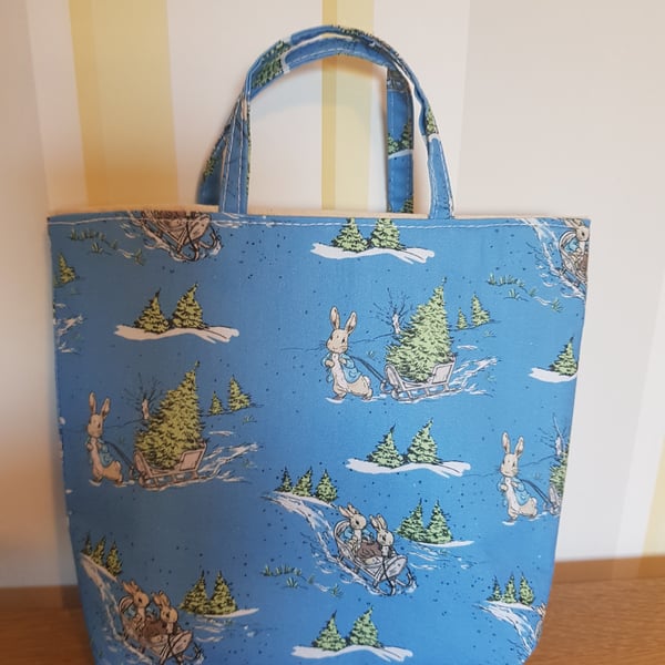 Reusable Christmas gift bag: Peter Rabbit sledges