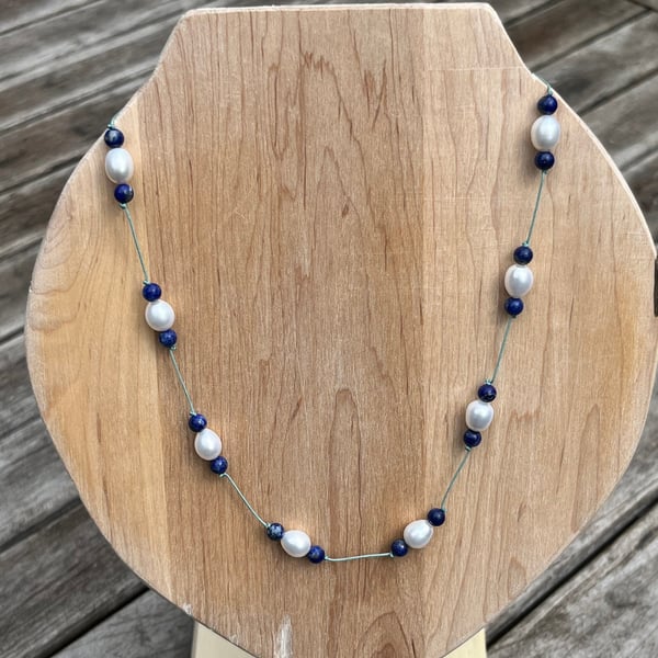 A Freshwater Pearl and Lapis Lazuli adjustable necklace
