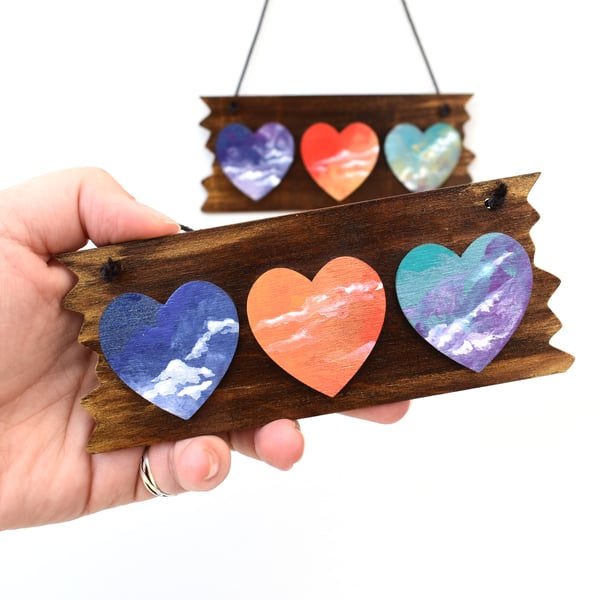 Hearts in the sky. Hand painted mini plaque, with beautiful skies.
