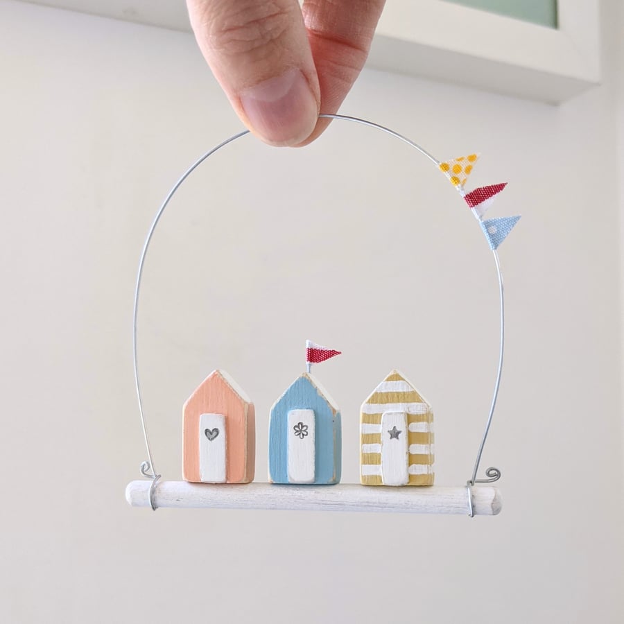 Tiny Hanging Wooden Beach Huts with Bunting