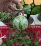 Snowdrop hand-painted ceramic Christmas bauble - Image 1