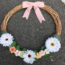 Grapevine wreath, hand decorated with daisies: pink, white, green, orange  