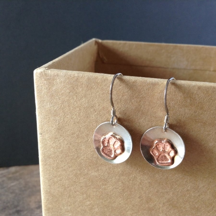 Paw earrings in sterling silver and copper
