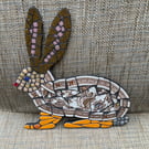 Whimsical mosaic hare