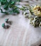 Green Sparkly Hypoallergenic Silver Stud Earrings - Image 4