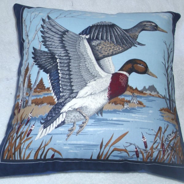 Coming in to land, Ducks on a lake cushion