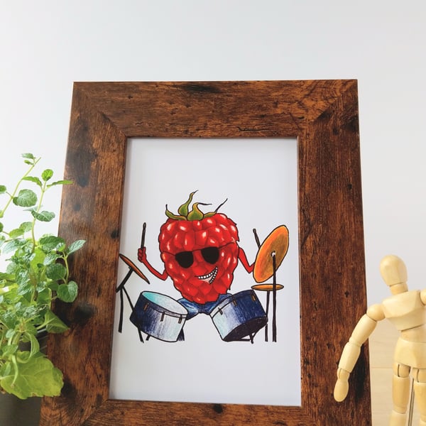 Illustration print of raspberry character playing the drums