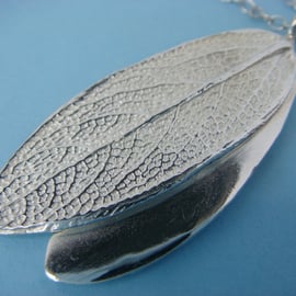 Double sage leaf pendant in fine silver with a silver trace chain. Double sided.