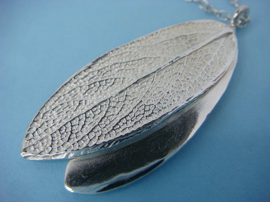 Double sage leaf pendant in fine silver with a silver trace chain. Double sided.