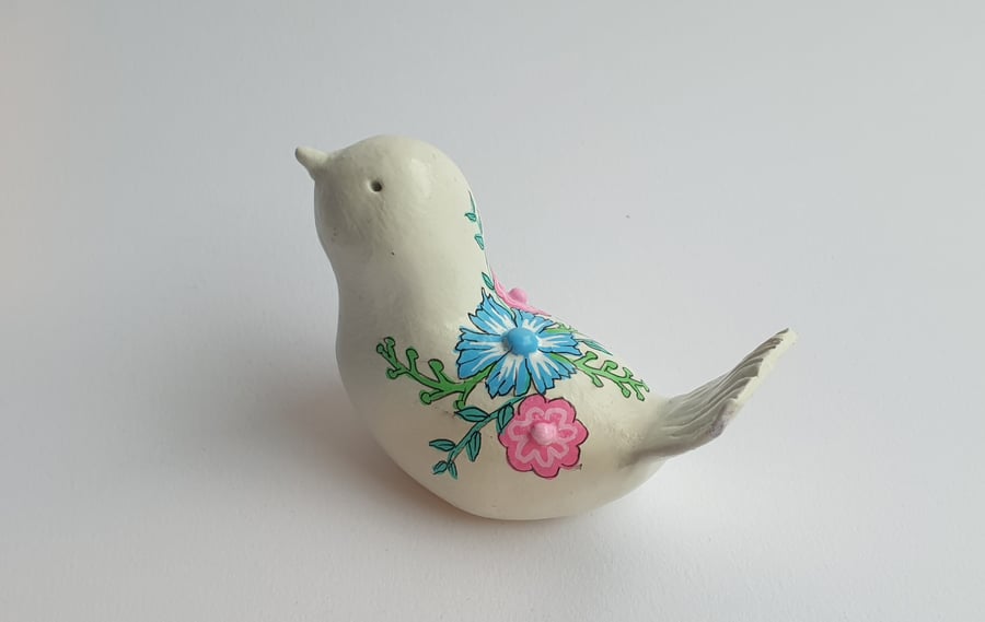 Handmade Clay bird ornament.