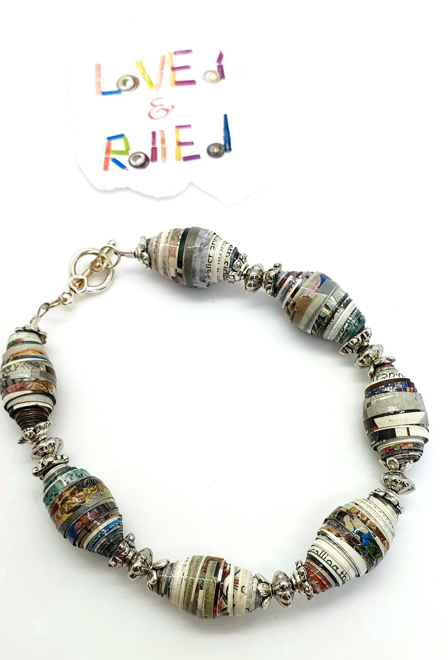 Bracelet made of blue and multicolored paper beads