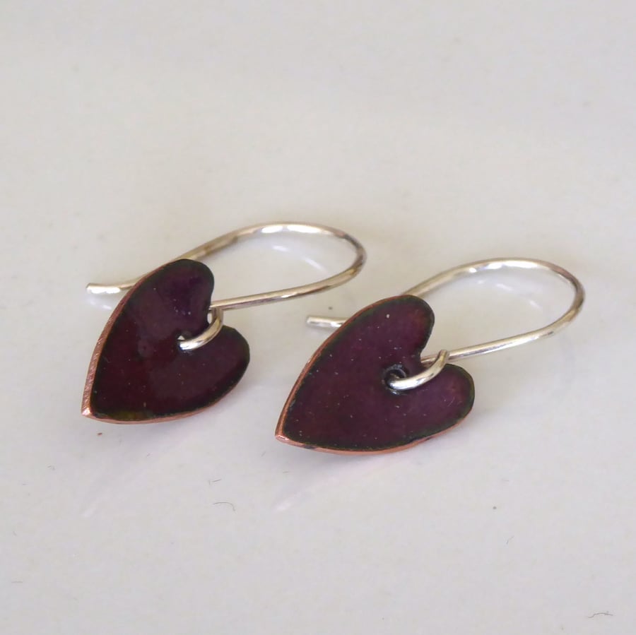 Elongated purple heart earrings