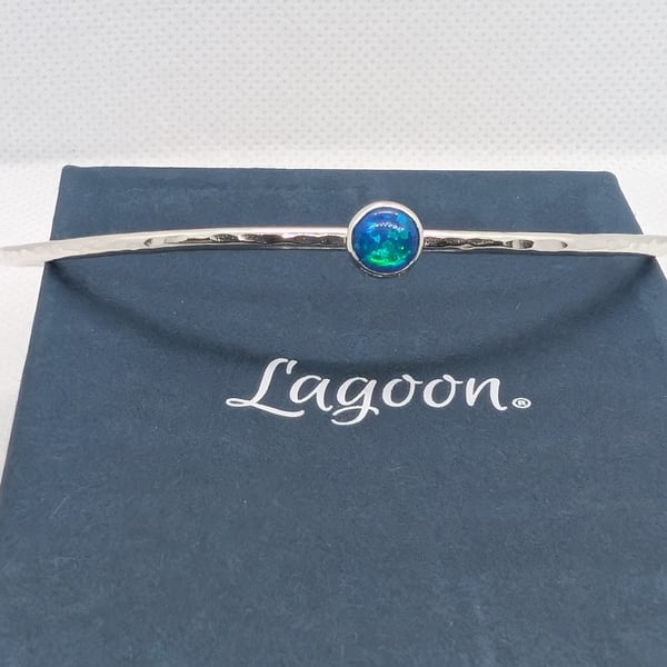 Sterling silver bangle with synthetic opal stone, hammered finish.