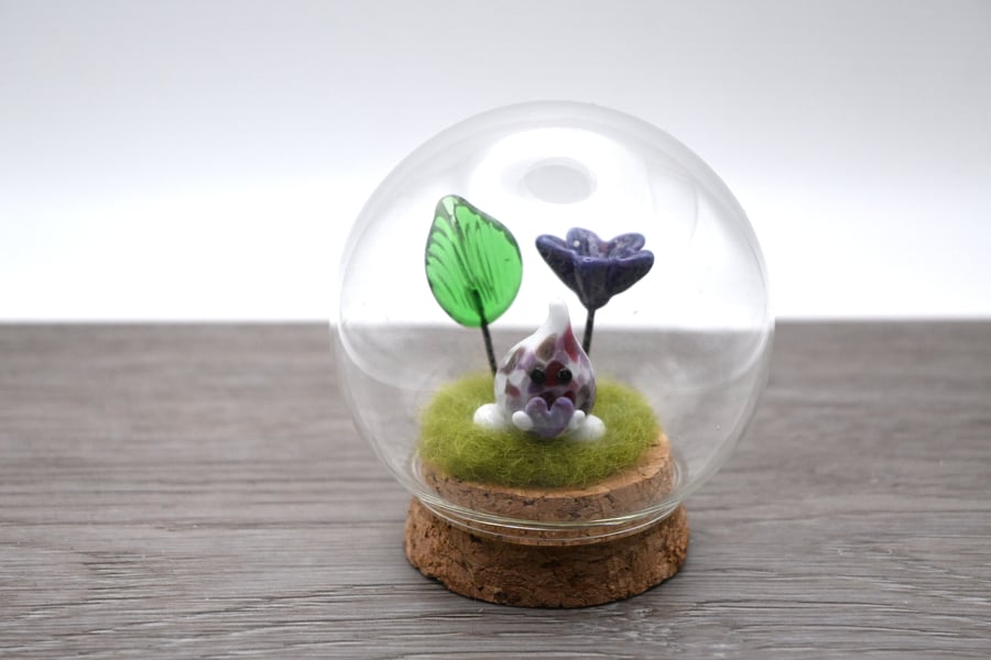 small glass wisp with purple heart and flower