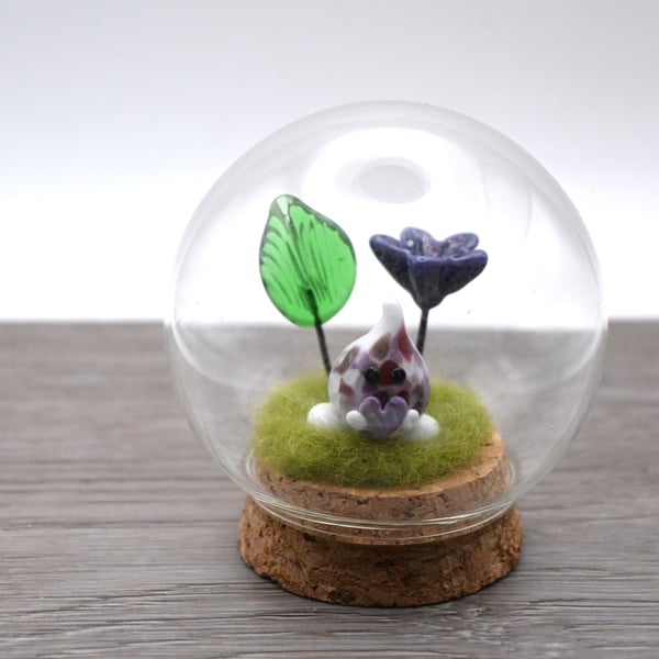 small glass wisp with purple heart and flower