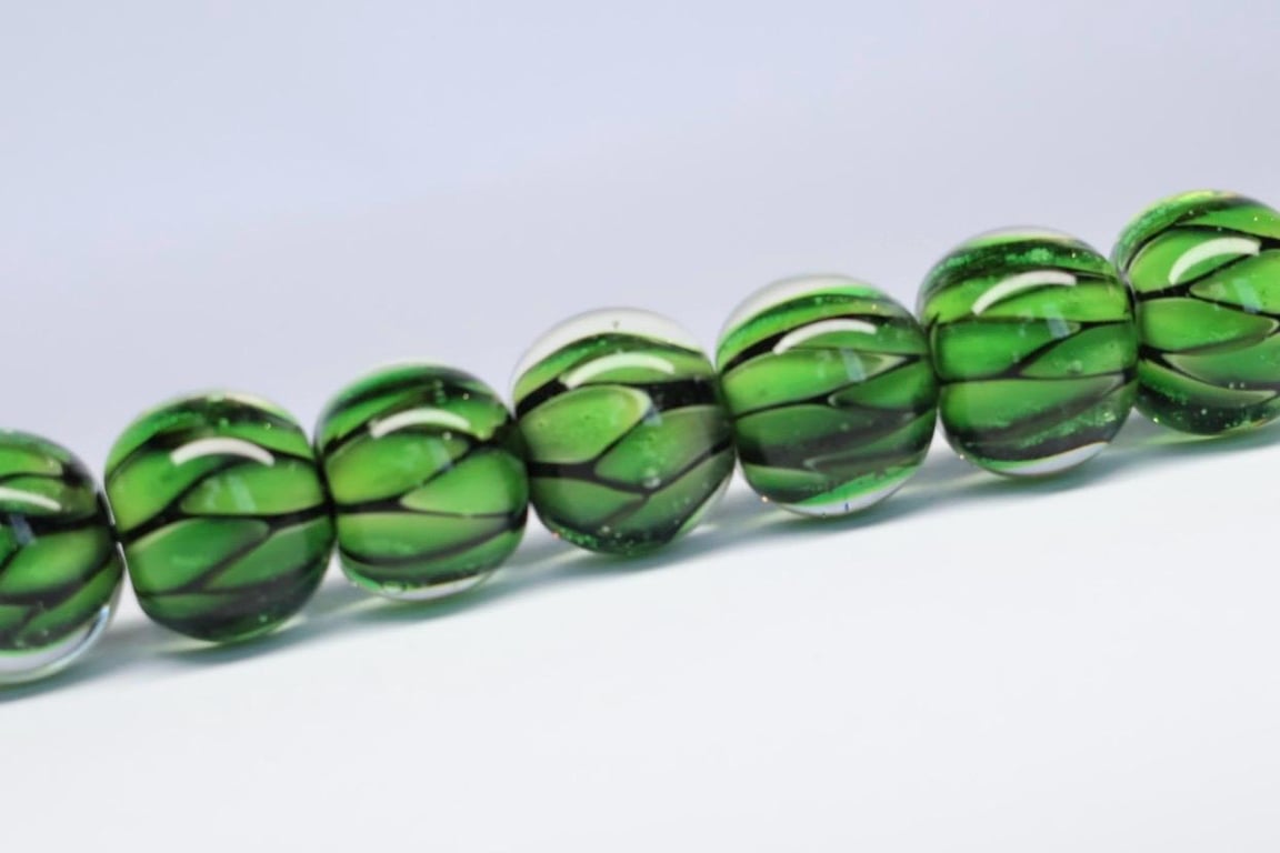 Handmade green snakeskin patterned lamp work glass beads