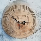 Handcrafted pine wall clock with quartz movement.