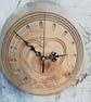 Handcrafted pine wall clock with quartz movement.