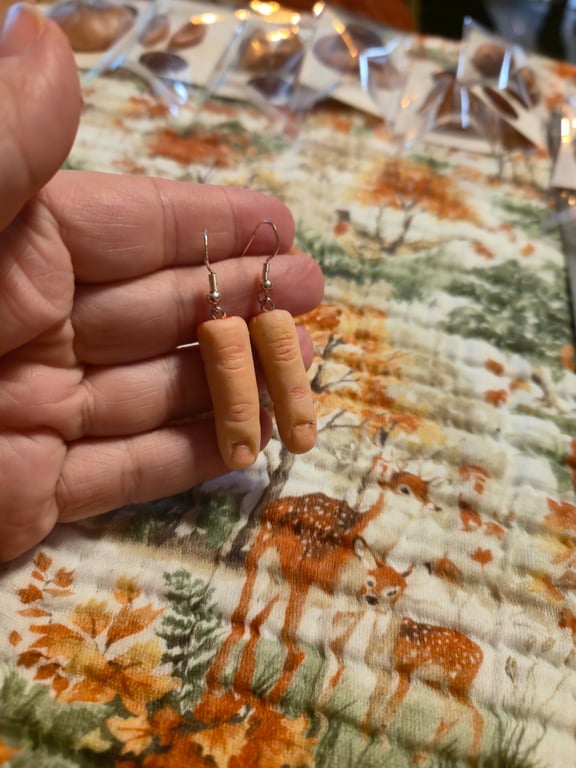 Serial killer trophy chopped off finger earrings