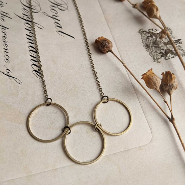 Golden Circles necklace - triple circle row - geometric jewellery - minimalist