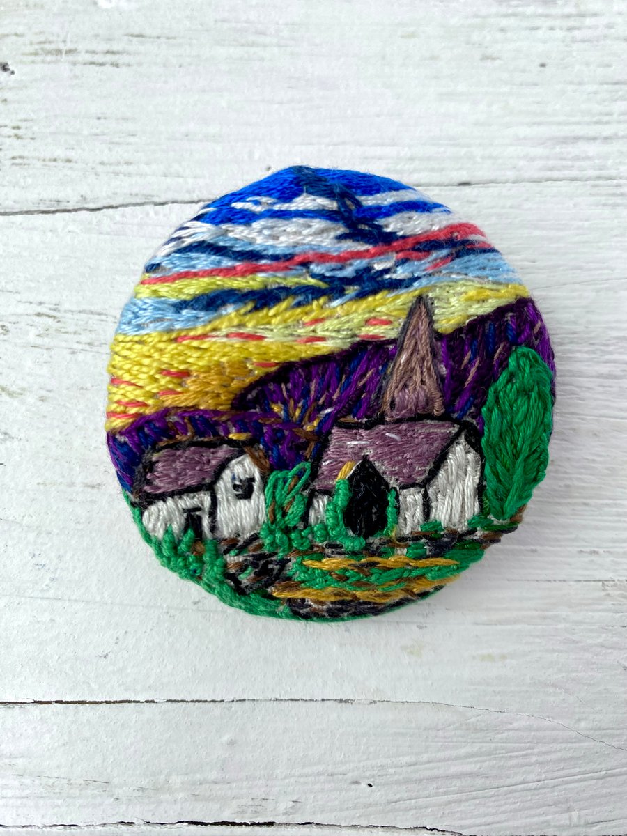 Brooch, Hand embroidered Church against  mountain sunset