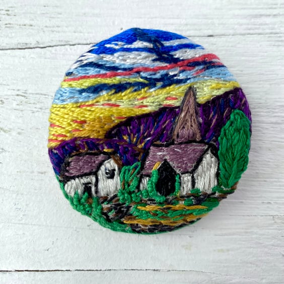 Brooch, Hand embroidered Church against  mountain sunset