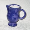 Small jug or creamer in blue glaze.