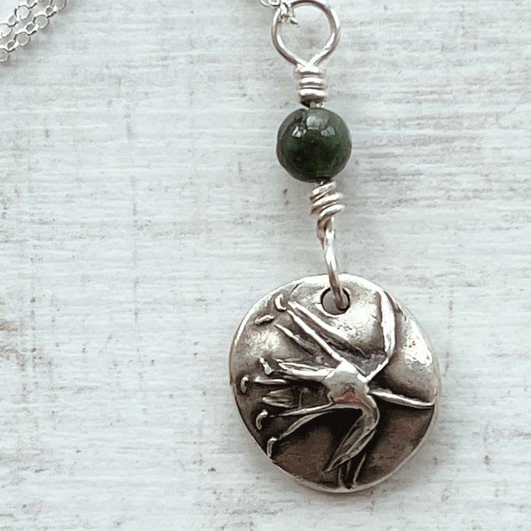 Silver botanical necklace with Allium and Dark Green Tourmaline.