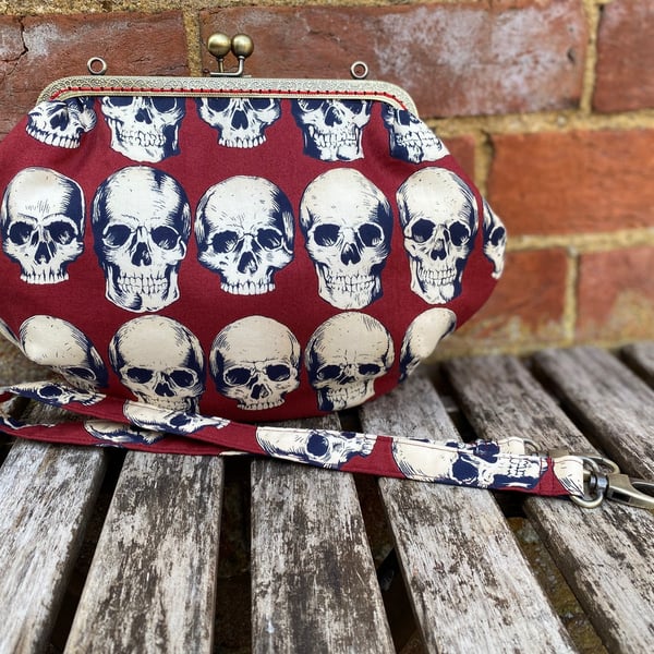 Gothic skulls medium fabric frame clutch handbag, Kiss clasp