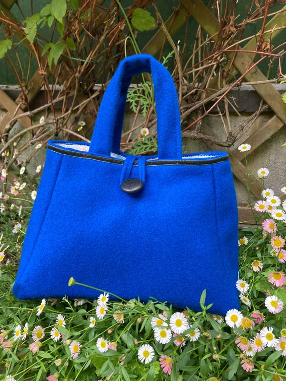 Blue woollen stylish modern handbag.