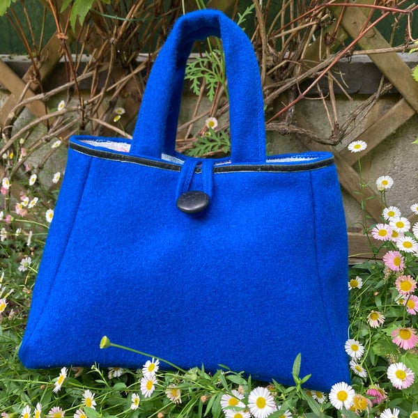 Blue woollen stylish modern handbag.