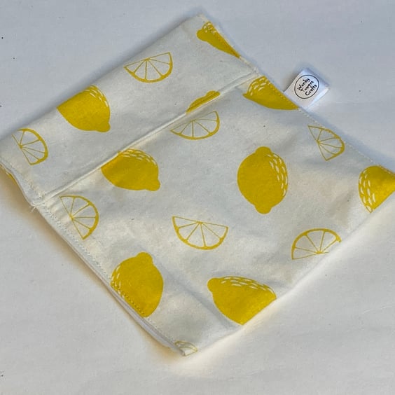 Reusable snack bag with food safe lining. Lemons