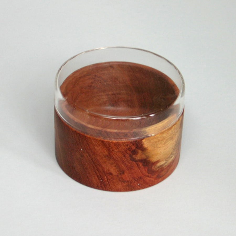 A glass and wood trinket pot