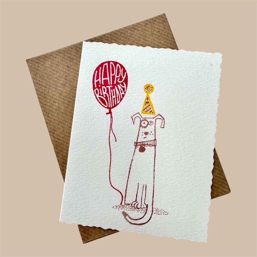 Birthday card, cute dog in a party hat, balloon, dogs birthday, from the dog. 