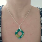 Polymer green and gold necklace on a silver plated chain