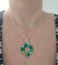 Polymer green and gold necklace on a silver plated chain