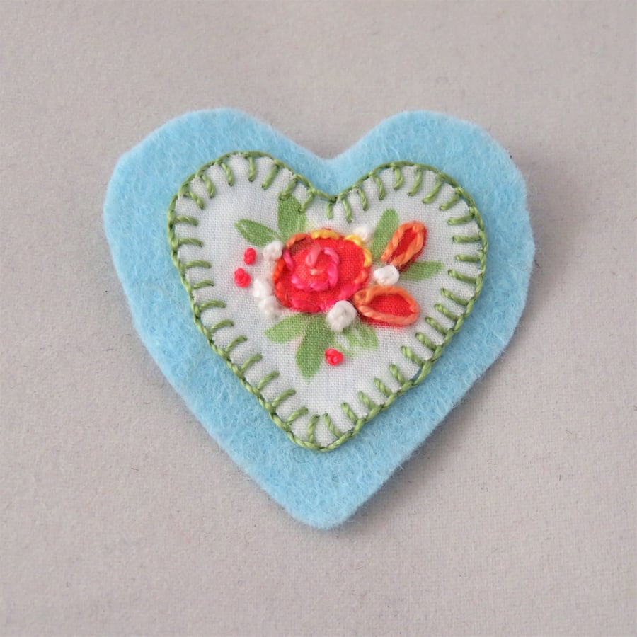 Heart and roses - painted and embroidered brooch on light blue felt