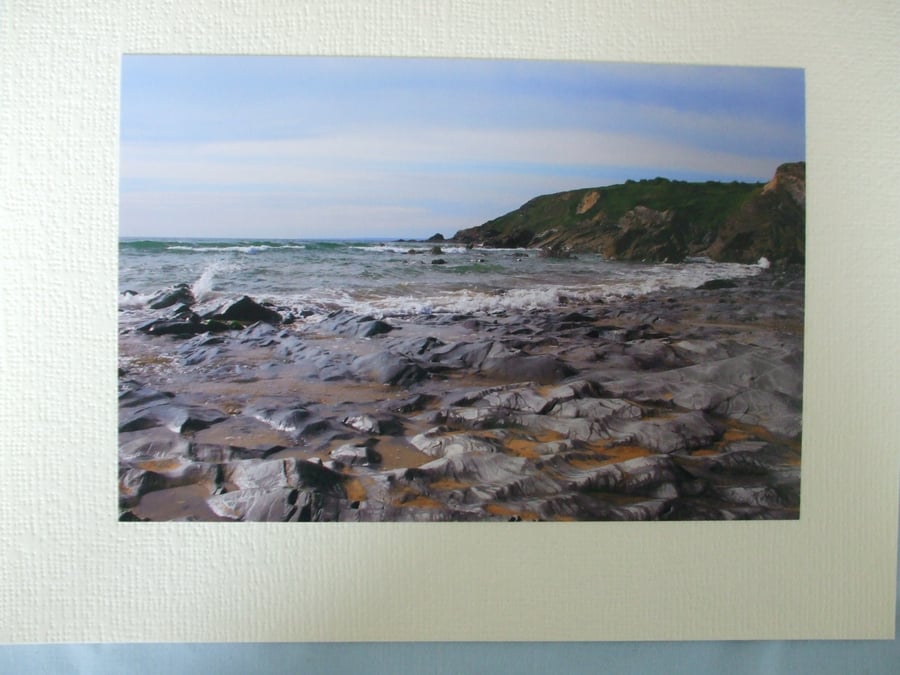 Photographic greetings card of sea washed rock at Church Cove in Cornwall. 