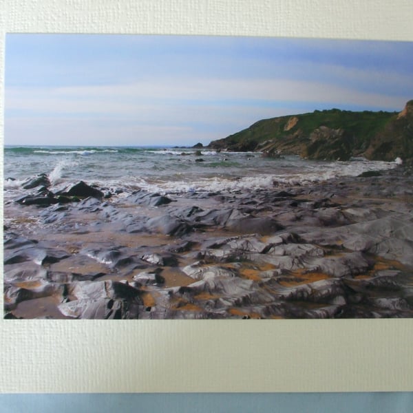 Photographic greetings card of sea washed rock at Church Cove in Cornwall. 