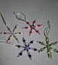 Set of four beaded snowflake decorations - Image 1