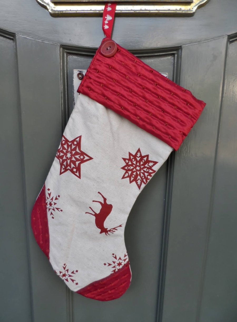 Christmas Scandinavian Stocking with reindeers and snowflakes.