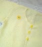 Girl's Knitted White Textured Cardigan with Yellow Daisy Embellishments - Image 7