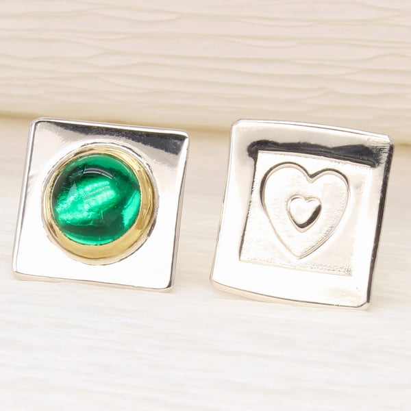 Handmade ear studs, asymmetrical with  a green Spinel stone and a heart shape. 
