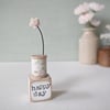 Clay Flower on a Teeny Bobbin 'happy day