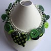 Green and black button bracelet