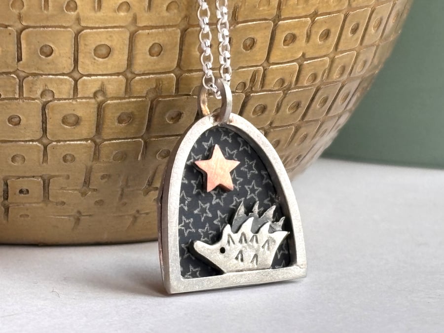 Tiny hedgehog necklace